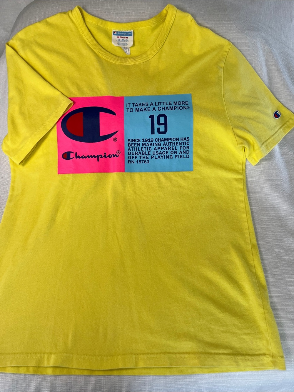 Champion Yellow Short-Sleeve Tee with Pink & Blue Logo Blocks
